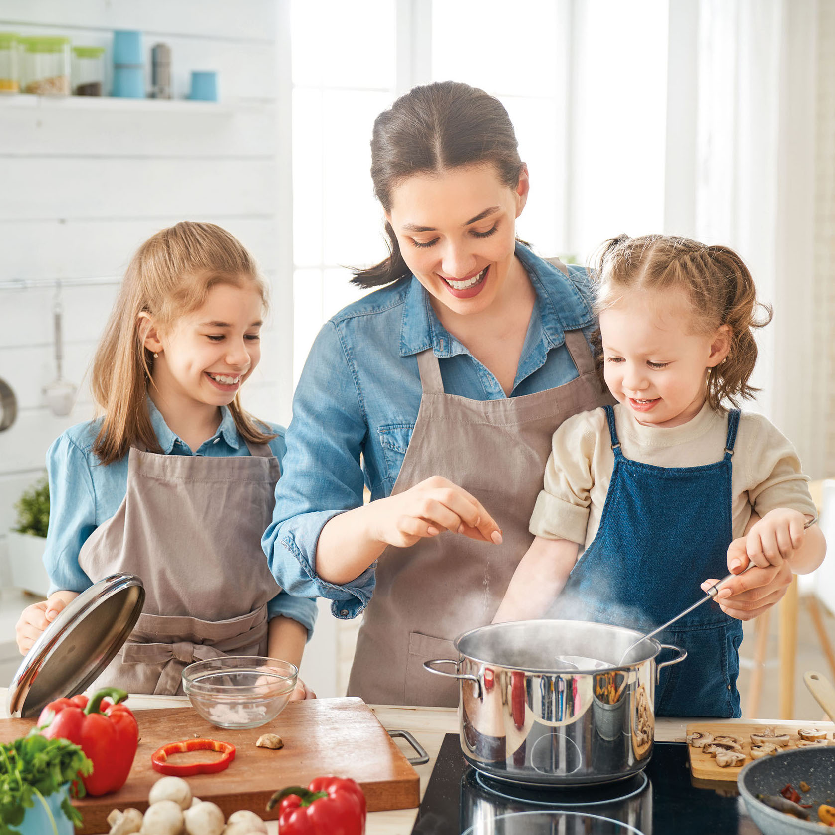 Happy family in the kitchen.